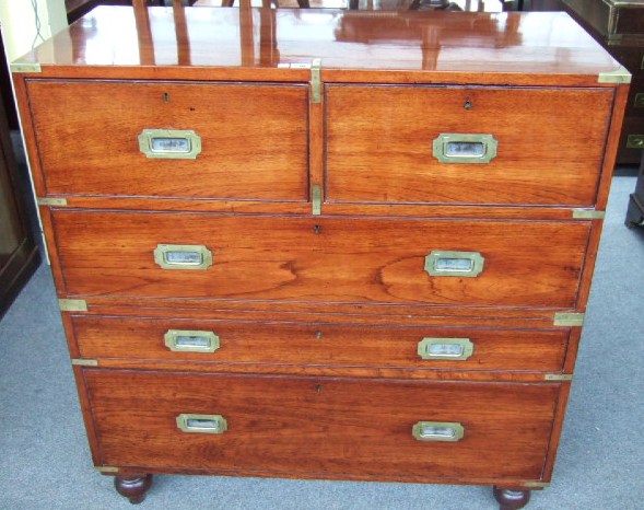 Appraisal: A th century teak campaign chest with two short drawers