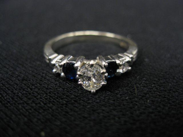 Appraisal: Diamond Ring oval center diamond weighing carat with diamond sapphire