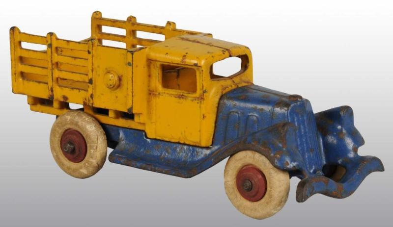 Appraisal: Cast Iron Hubley Stake Truck Toy Description Rubber tires Size