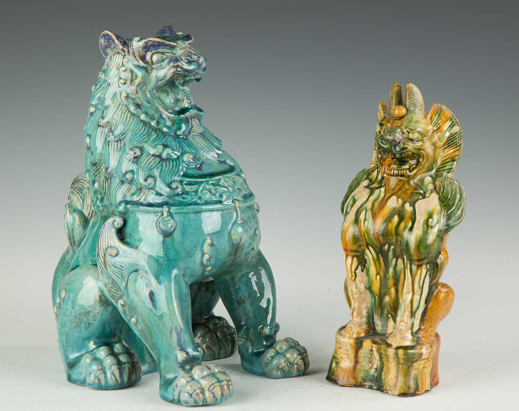 Appraisal: Chinese Guard Lion With Turquoise Glaze Sancai glaze