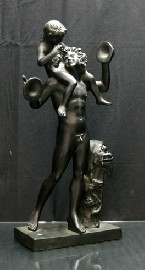 Appraisal: A bronze figural group of Pan and a boy after