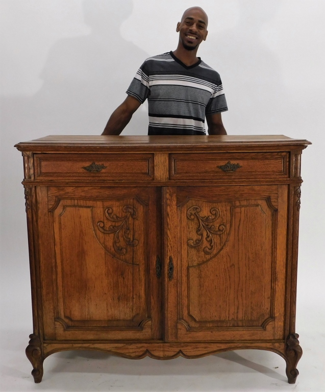 Appraisal: FRENCH OAK CARVED TENDRIL SIDEBOARD SERVER France th- th CenturyRectangular