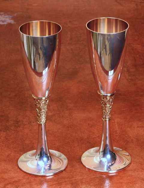 Appraisal: A PAIR OF SILVER AND PARCEL GILT WINE GOBLETS the