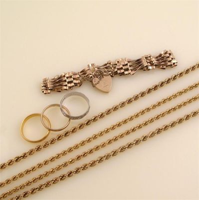 Appraisal: Two ct gold rope link necklace g Three gold wedding