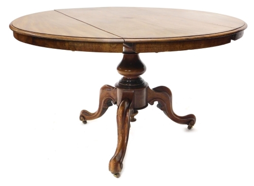 Appraisal: A Victorian mahogany drop leaf table the circular top with