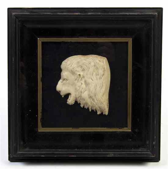 Appraisal: A Continental Wax Bust of a Lion set in an