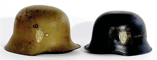 Appraisal: Two German war helmets WWII M and WWI helmet both