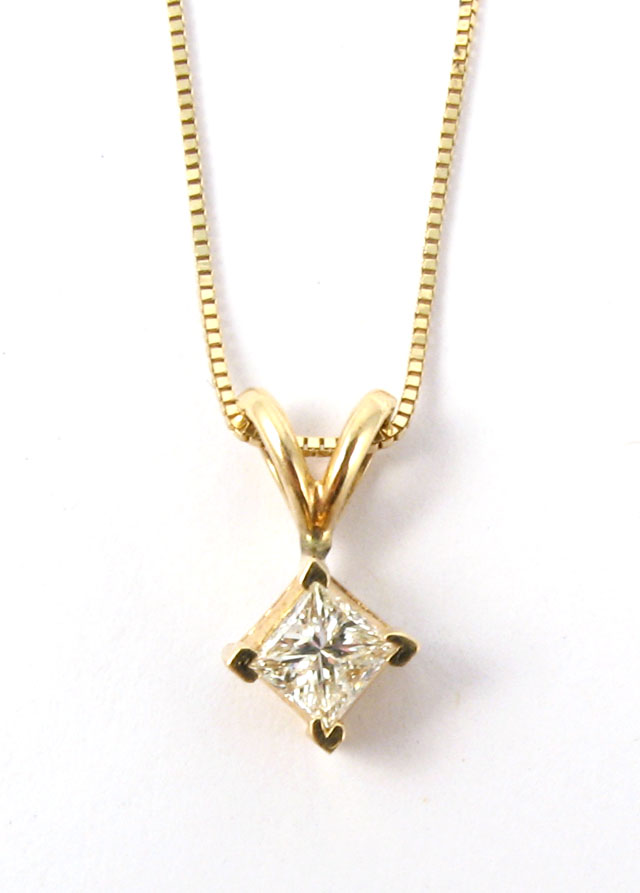 Appraisal: DIAMOND AND YELLOW GOLD PENDANT NECKLACE The pendant is suspended