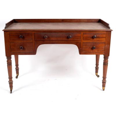 Appraisal: A Victorian mahogany washstand circa with a moulded top over