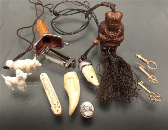 Appraisal: Assortment of ivory carved wood and metal accessories