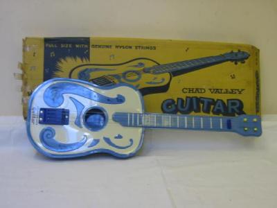 Appraisal: A Chad Valley toy guitar tin plate with nylon strings