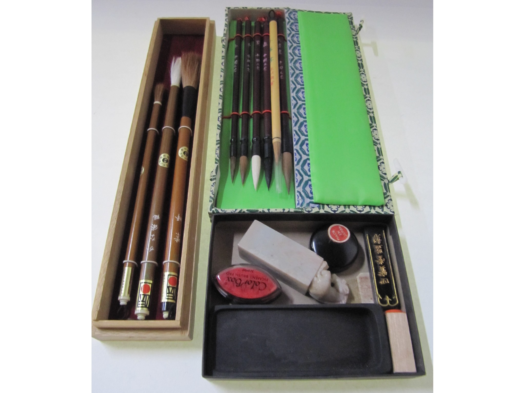 Appraisal: A box of assorted oriental painting and writing items