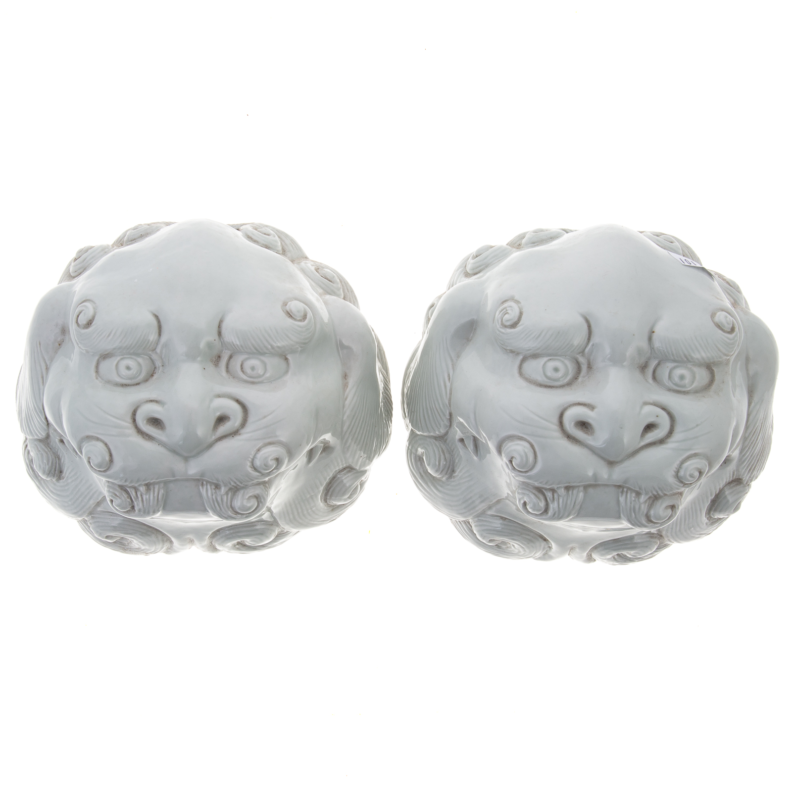 Appraisal: A PAIR OF CHINESE PORCELAIN FOO DOG MASK WALL POCKETS