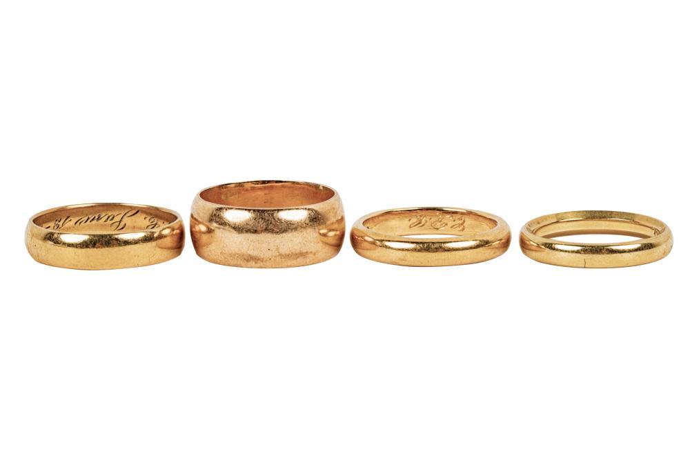 Appraisal: GROUP OF FOUR KARAT YELLOW GOLD WEDDING BANDSthe first measuring