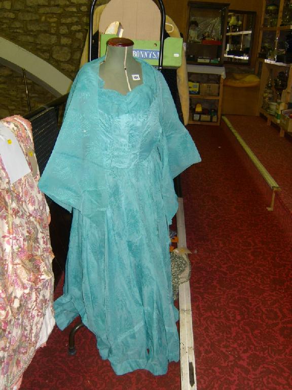 Appraisal: A collection of textiles and costumes including a sea green