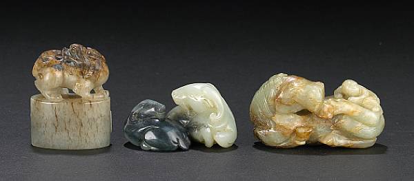 Appraisal: A group of three jade animal carvings The first a