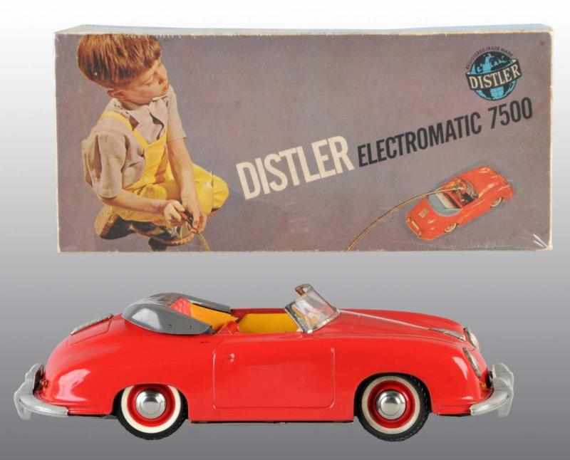 Appraisal: Tin Distler Porsche Automobile Wind-Up Toy Description German Circa s