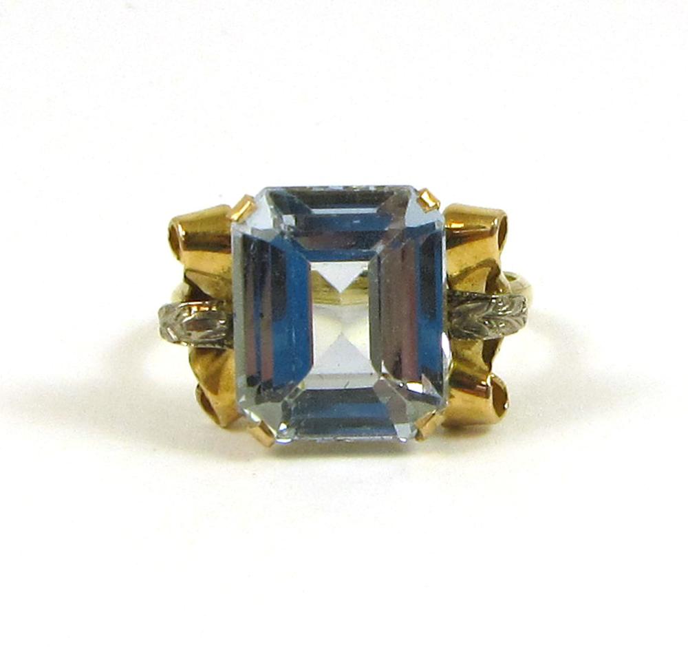 Appraisal: AQUAMARINE AND FOURTEEN KARAT GOLD RING set with a single