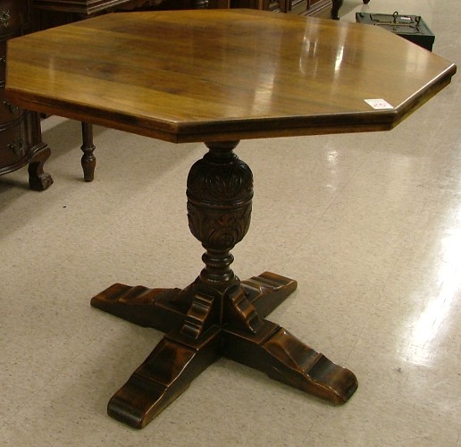 Appraisal: ELIZABETHAN REVIVAL CENTER TABLE American c 's The solid walnut