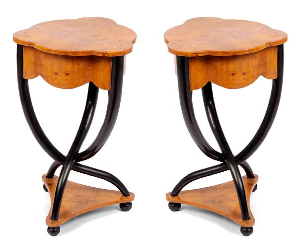 Appraisal: A pair of Biedermeier style triangular tables height in width