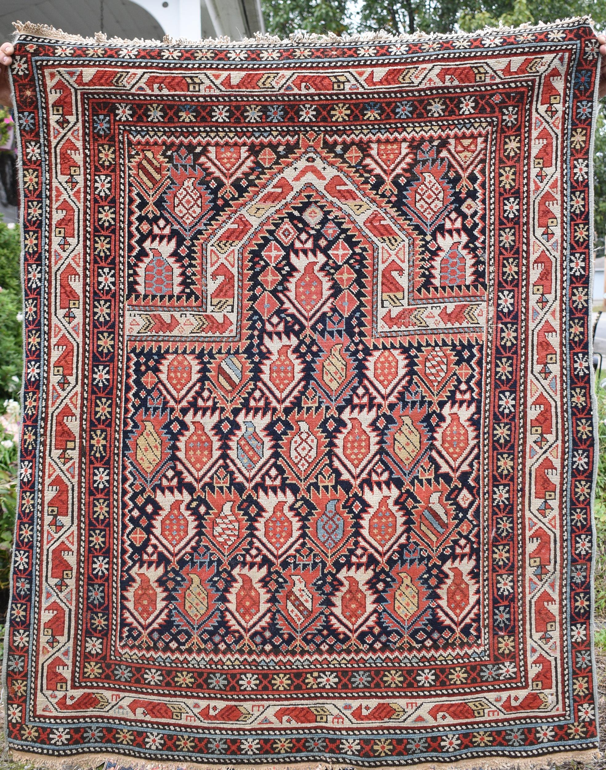 Appraisal: ANTIQUE CAUCASIAN PRAYER RUG SHIRVAN An antique Caucasian Shirvan prayer