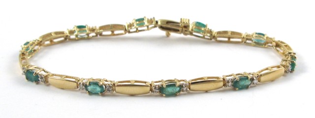 Appraisal: EMERALD AND DIAMOND BRACELET The k yellow gold bracelet is