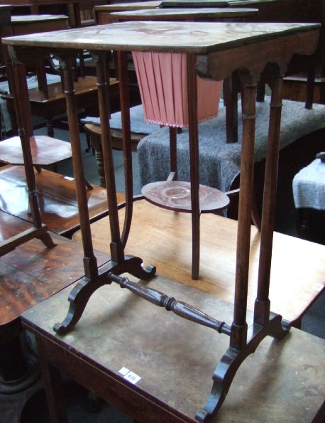 Appraisal: An early th century rosewood nesting table raised on turned