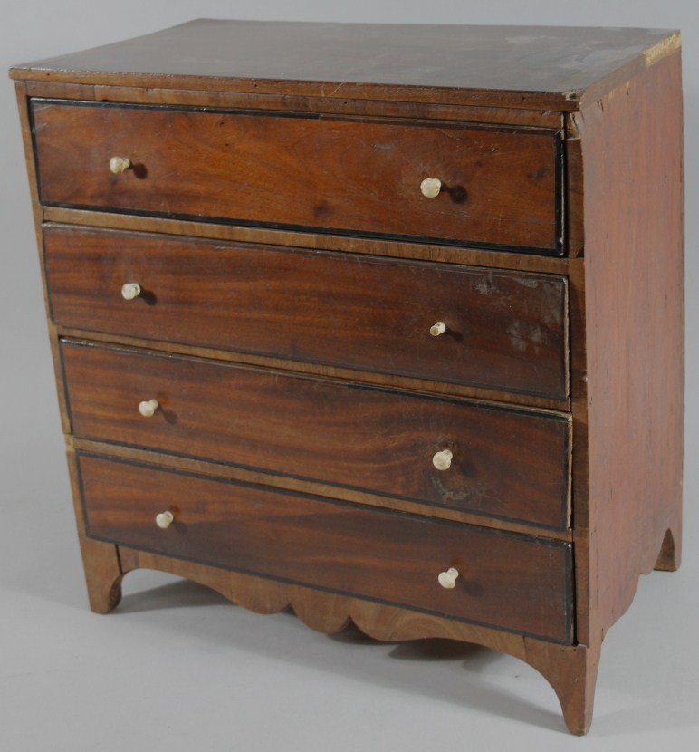 Appraisal: An apprentice piece mahogany chest of drawers of table top