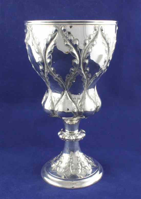 Appraisal: A Victorian silver presentation trophy cup of shaped vase form