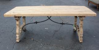 Appraisal: Spanish trestle table in bleached walnut with iron stretcher Spanish