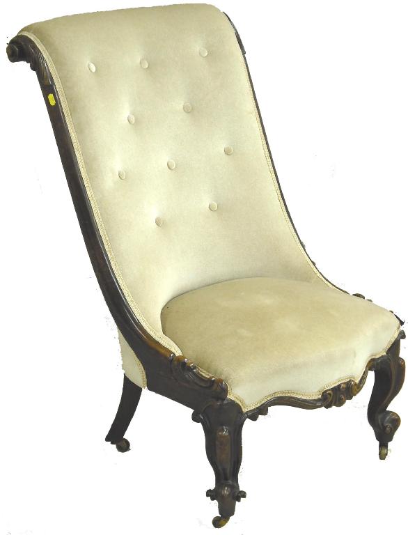 Appraisal: Victorian mahogany framed green velvet upholstered nursing chair with acanthus