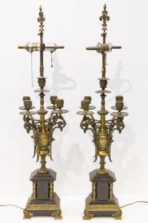 Appraisal: Black Marble Brass Candlestick Lamps Pair Antique black marble and