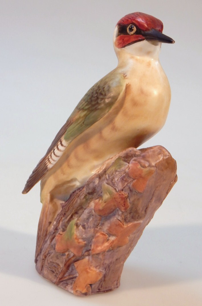 Appraisal: A Royal Worcester matt finish figure of a woodpecker no