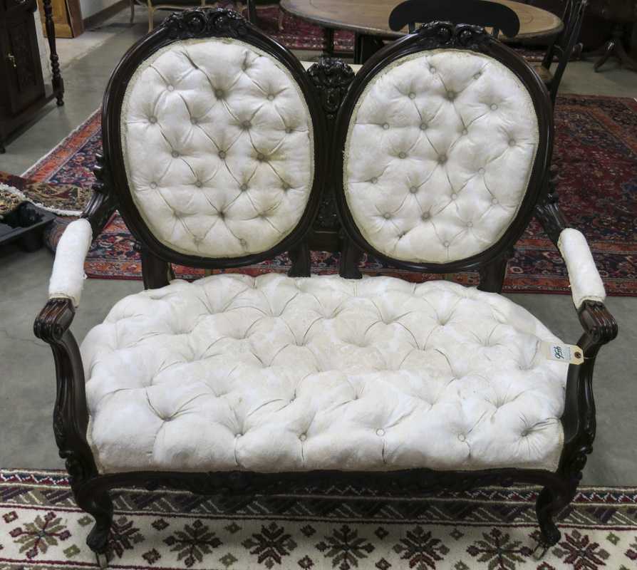 Appraisal: VICTORIAN DOUBLE MEDALLION-BACK SETTEE American c having a carved and