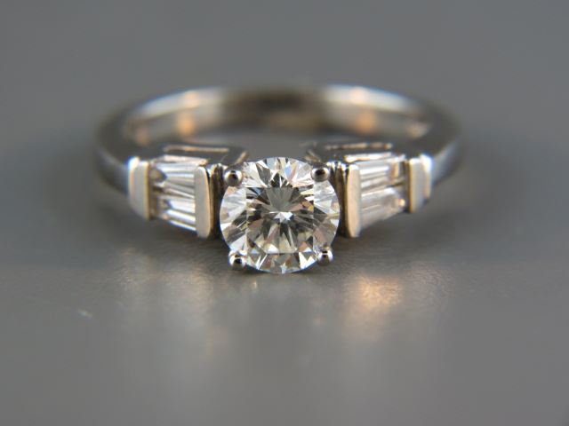 Appraisal: Diamond Ring carat roundbrilliant with baguette diamonds totaling carat in