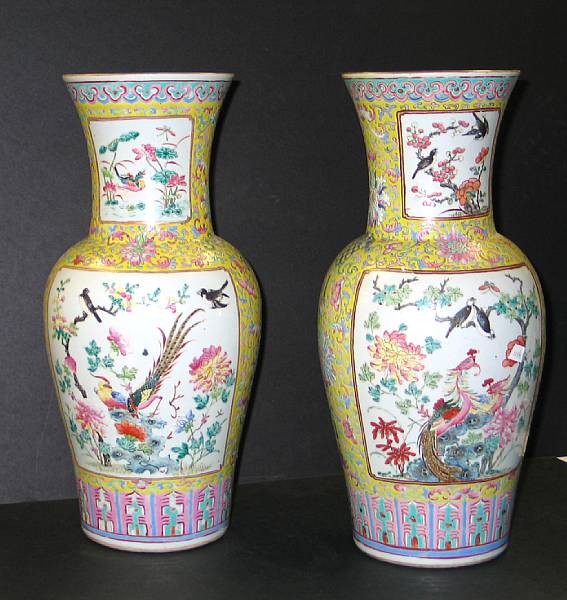 Appraisal: A pair of famille jaune enameled porcelain vases Each decorated