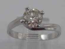 Appraisal: A white metal tests ct gold diamond solitaire ring the