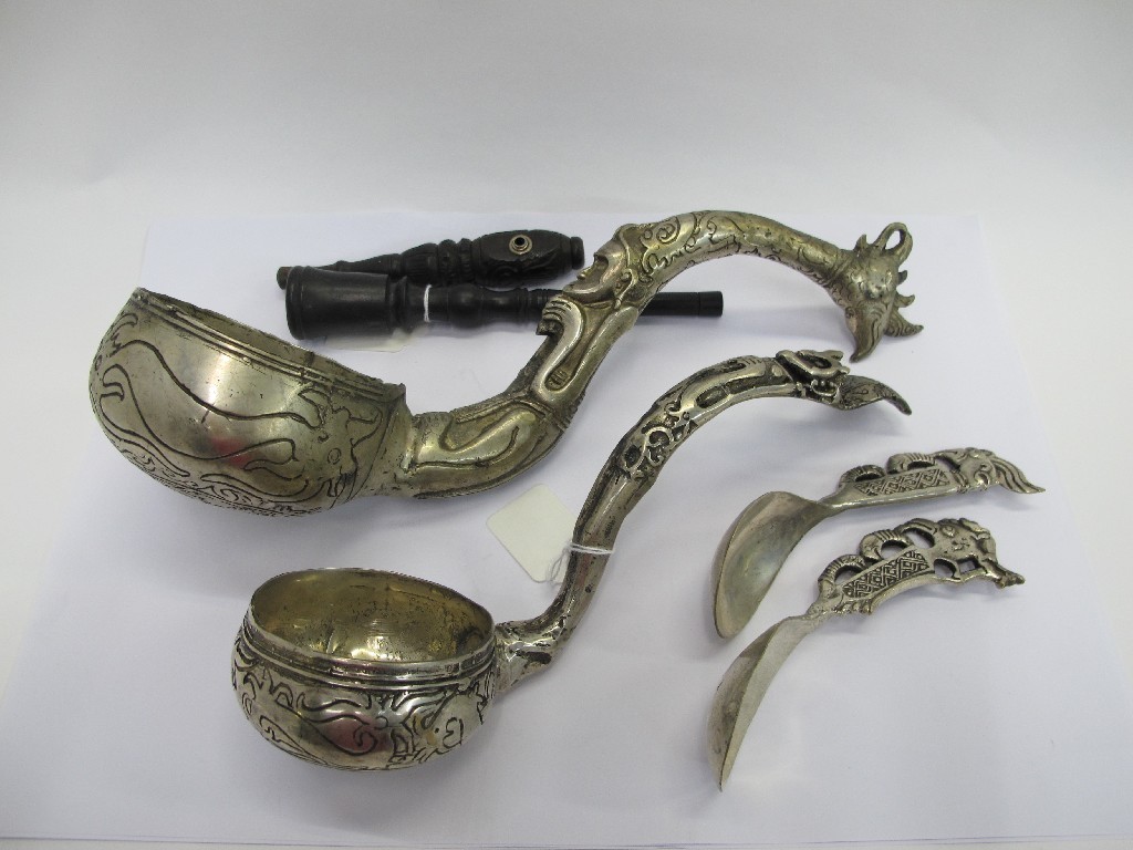 Appraisal: Lot comprising two South American white metal ladles a pair