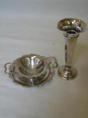 Appraisal: AN EDWARDIAN SPECIMEN VASE of panelled trumpet form with waved