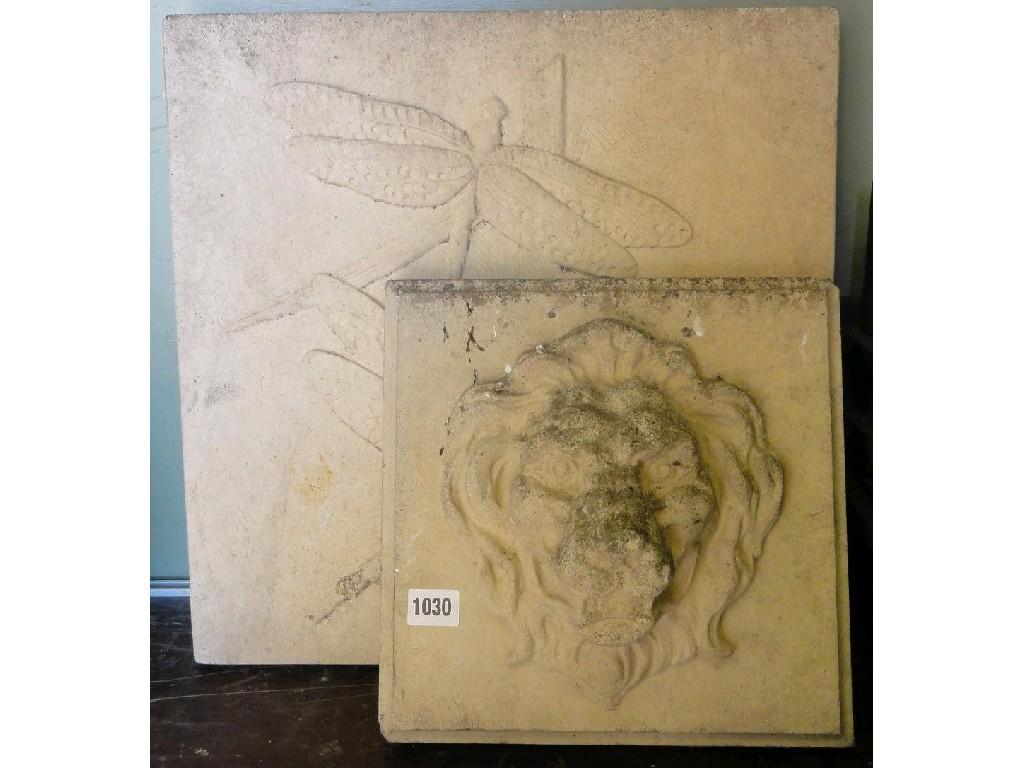 Appraisal: A composition stone wall plaque with raised relief dragonfly detail