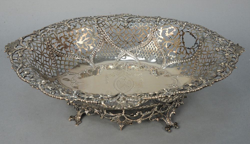 Appraisal: English Silver Reticulated Oval Footed Bowl center with coat of