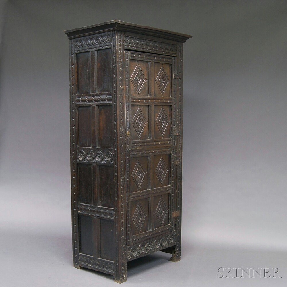 Appraisal: Carved and Paneled Oak Cupboard Europe th century the molded