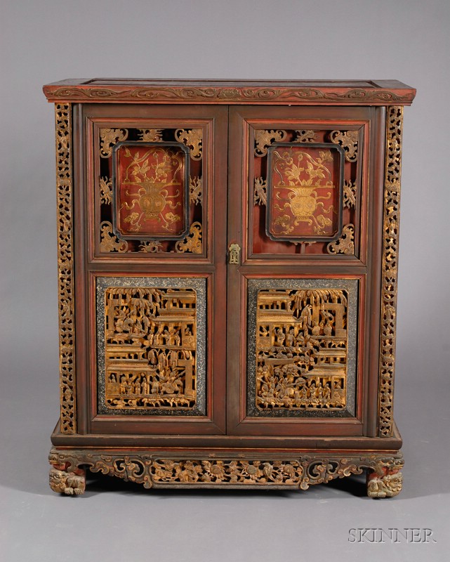 Appraisal: Two-door Cabinet China th century carved with figures in landscapes