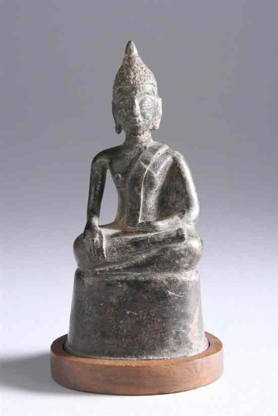 Appraisal: LAOTIAN BRONZE FIGURE OF SEATED BUDDHA Seated in dhyanasana wearing