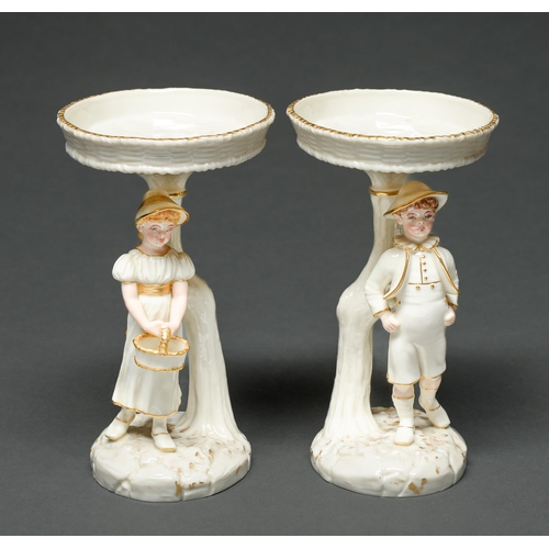 Appraisal: A pair of Royal Worcester single boy and girl early