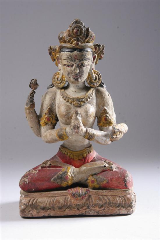 Appraisal: NEPALESE POLYCHROME WOOD FIGURE OF BODHISATTVA Seated on a lotus