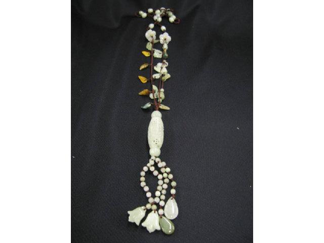 Appraisal: Jade Necklace multi-color carved jade tassel style end - long