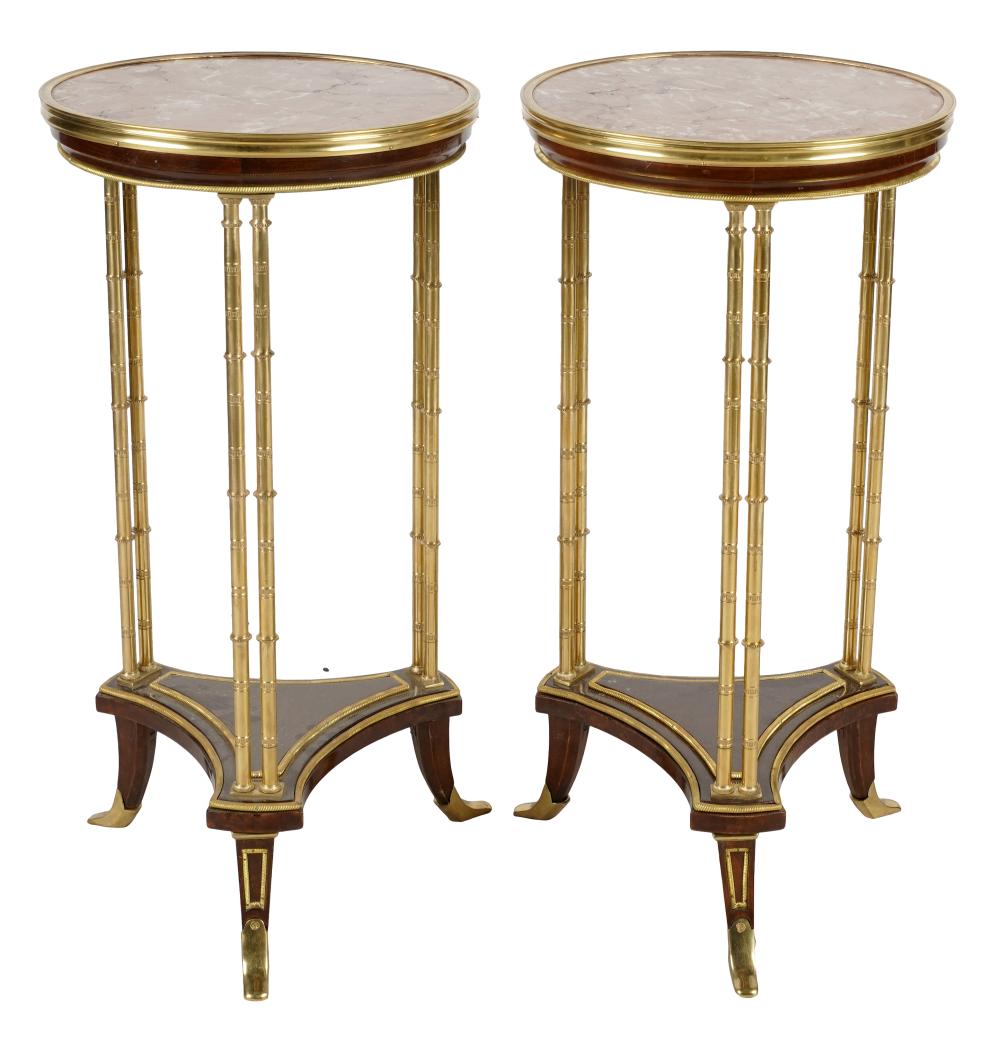 Appraisal: PAIR OF NEOCLASSIC GUERIDONSwith marble tops gilt metal supports and