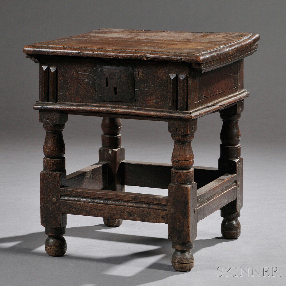 Appraisal: Jacobean-style Oak and Elm Lift-top Stool England th century and