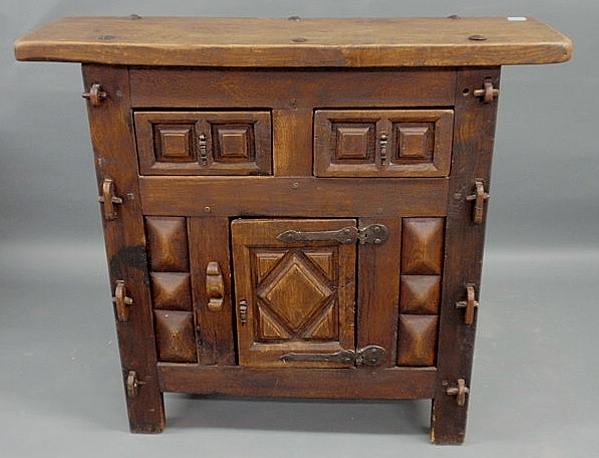 Appraisal: Continental medieval style walnut cabinet comprised of some period elements